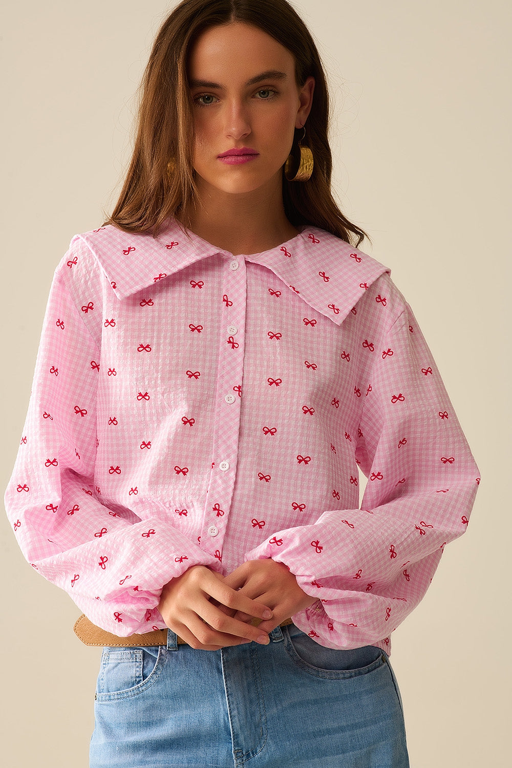 Blusa com Gola Peter Pan em Gingham Rosa com Estampa de Laço