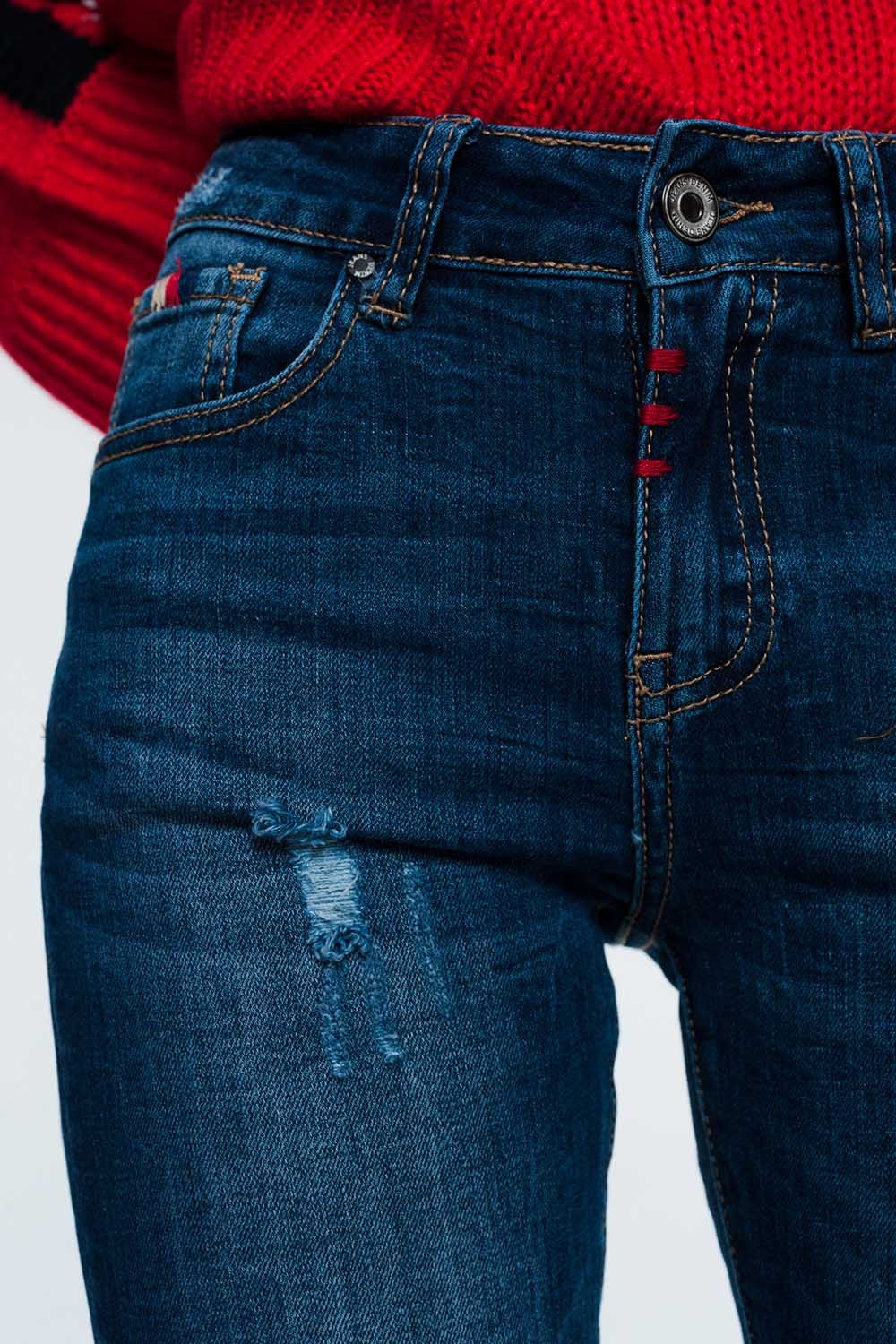 Calças de ganga slim com detalhe em fio colorido