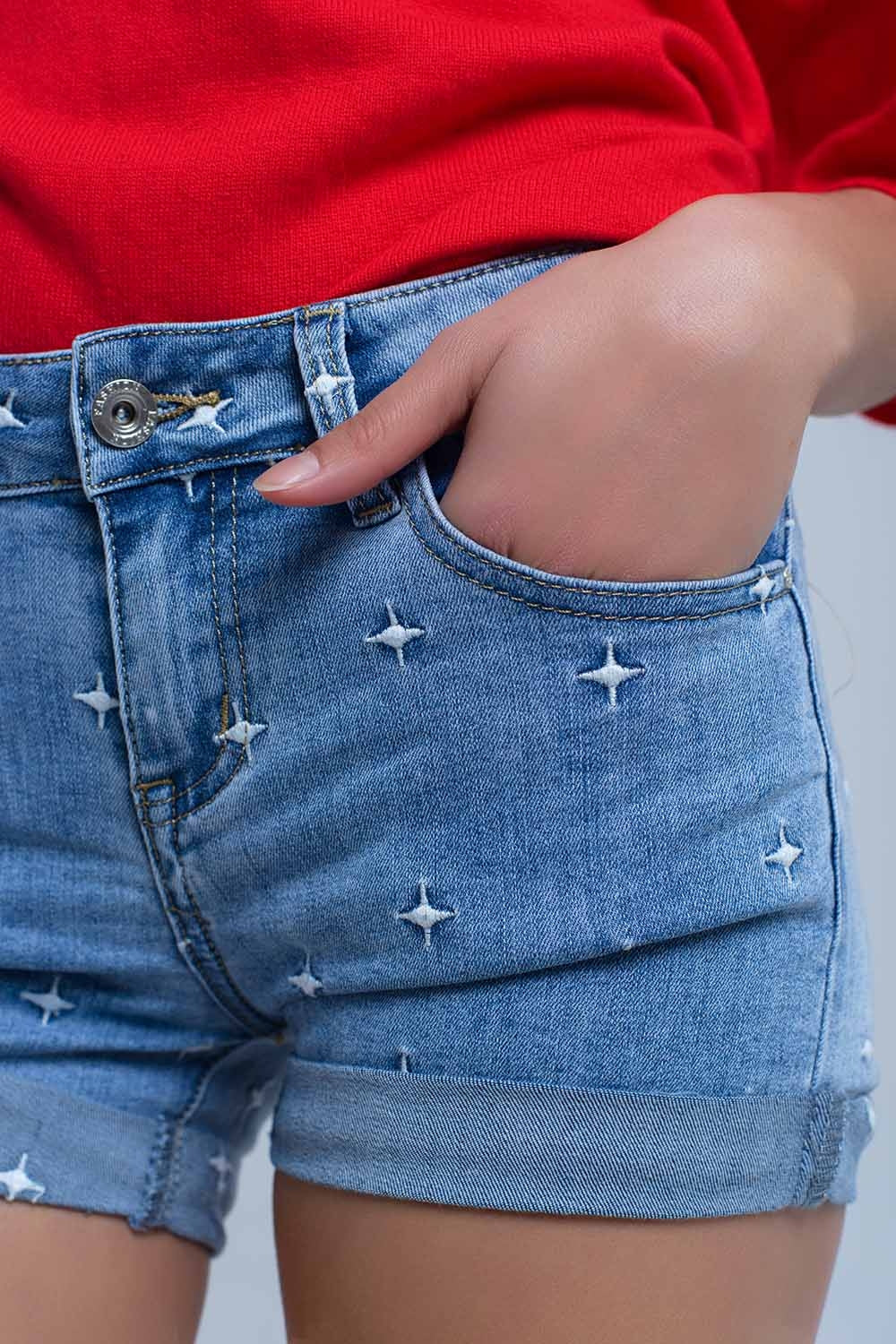 Calções jeans com detalhes das estrelas