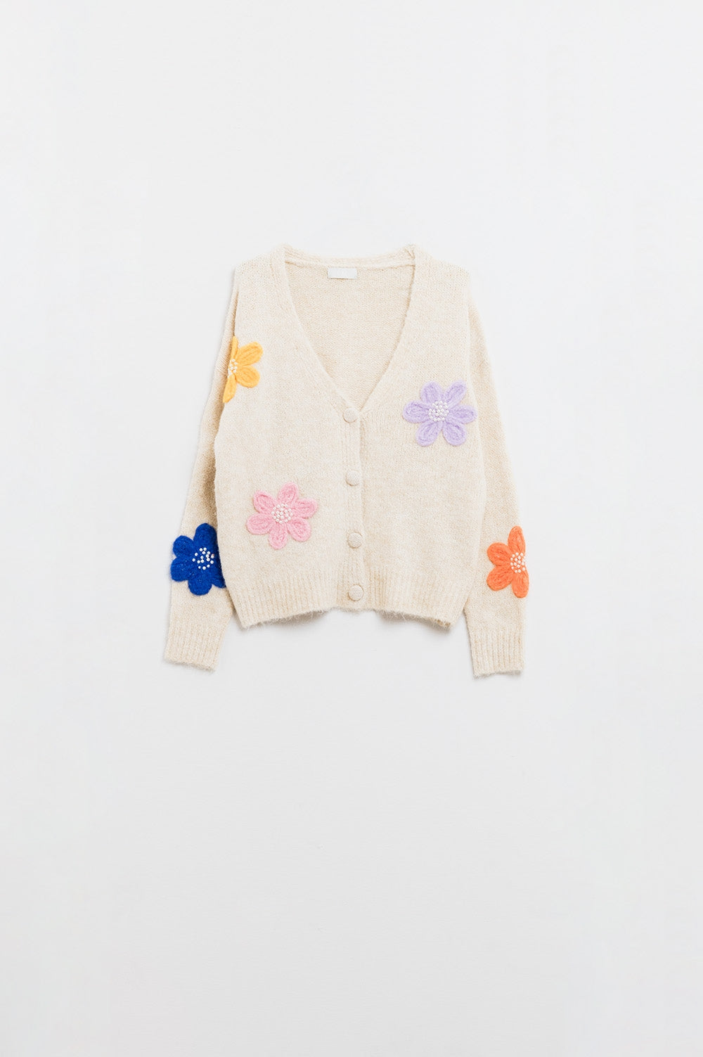 Casaco de malha creme com flores bordadas a EM