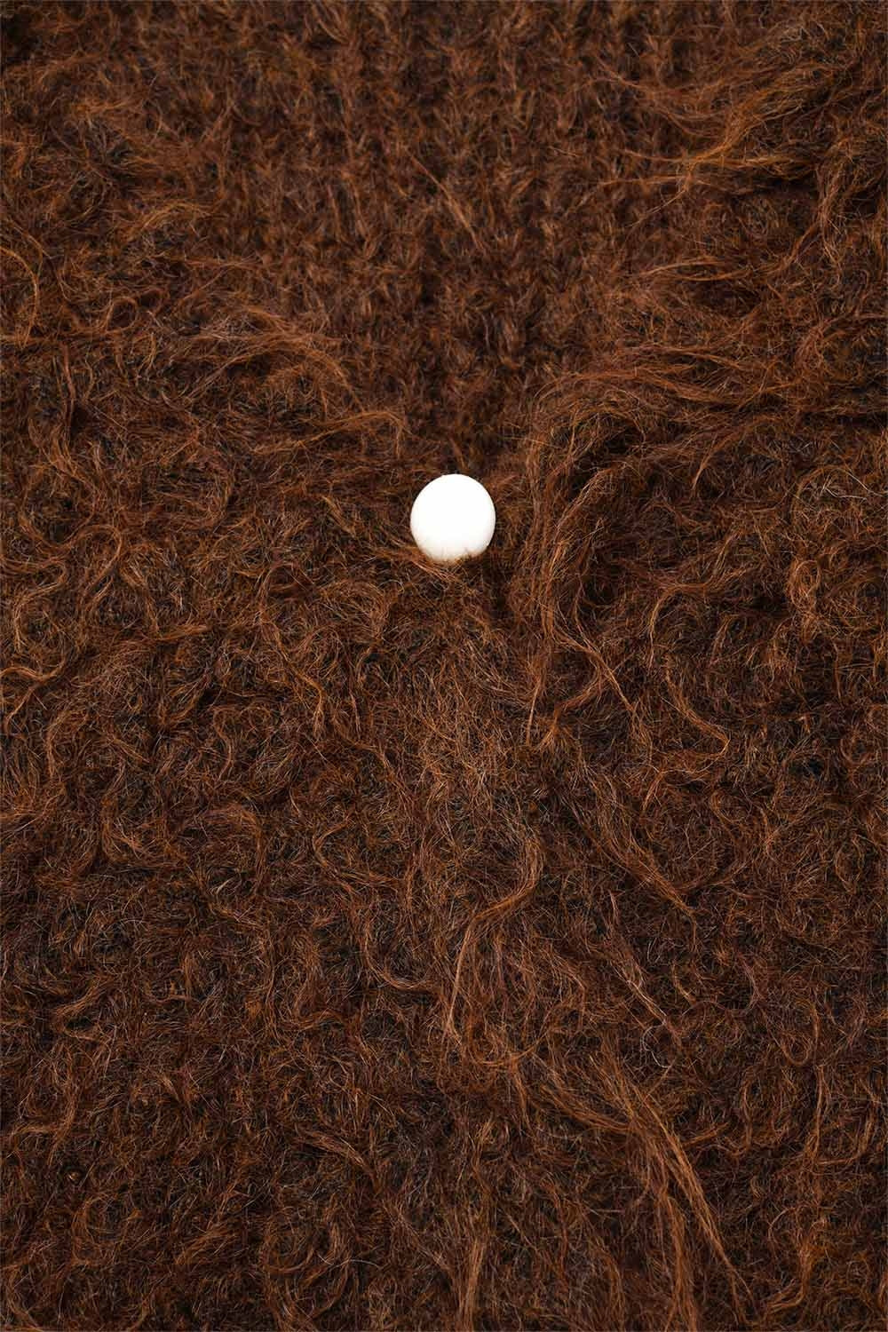Colete luxuoso com textura de pelo comprido castanho