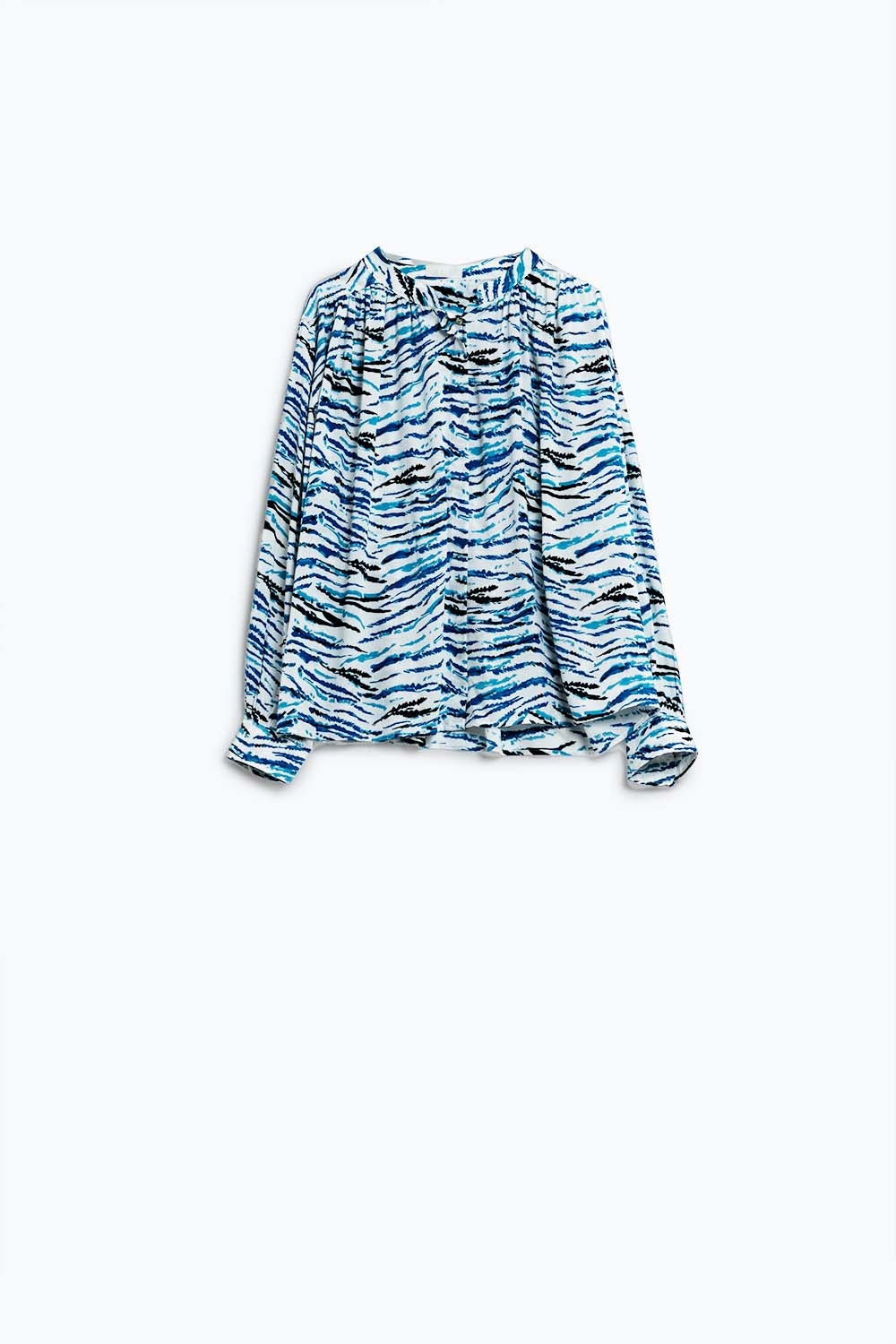 Q2 Blusa branca com estampado animal azul e mangas compridas