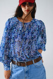 Q2 Blusa com estampado abstrato e mangas em balão em azul