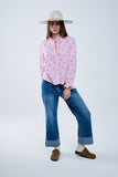 Blusa cor-de-rosa com pormenores de cerejas e laço atado