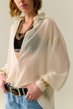 Blusa de chiffon bege suave com detalhe de brilho