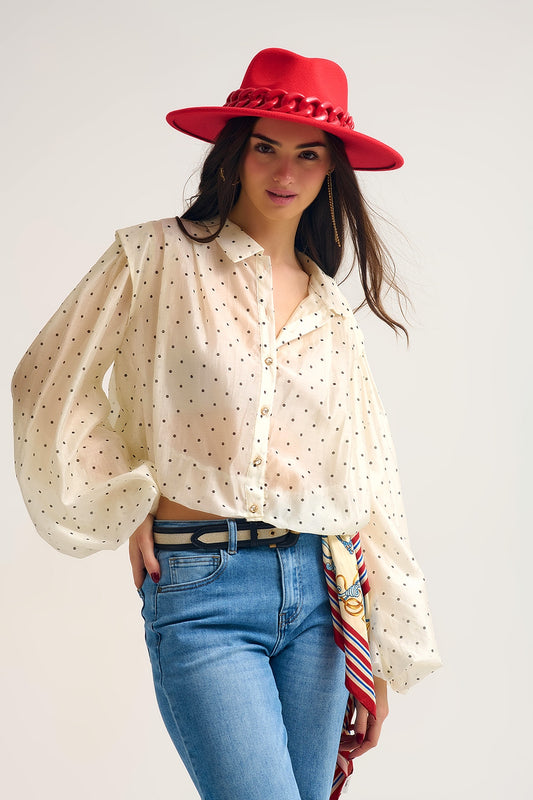 Blusa de seda às bolinhas em marfim com mangas em balão e botões dourados