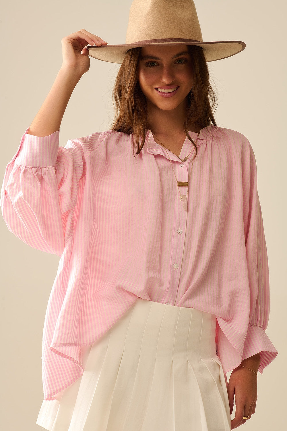 Blusa Listrada de Manga Bufante em Rosa
