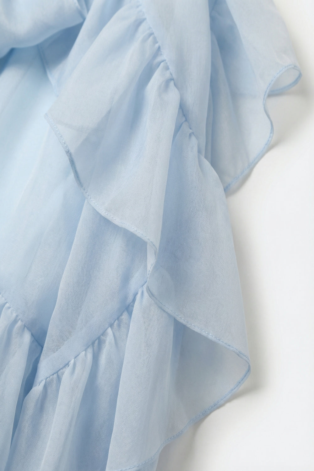 Blusa Transparente Azul Claro com Babados em Tecido de Chiffon