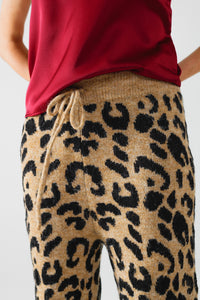 Calças com estampado de leopardo com malha elástica e pormenor de cordão