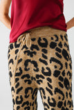 Calças com estampado de leopardo com malha elástica e pormenor de cordão