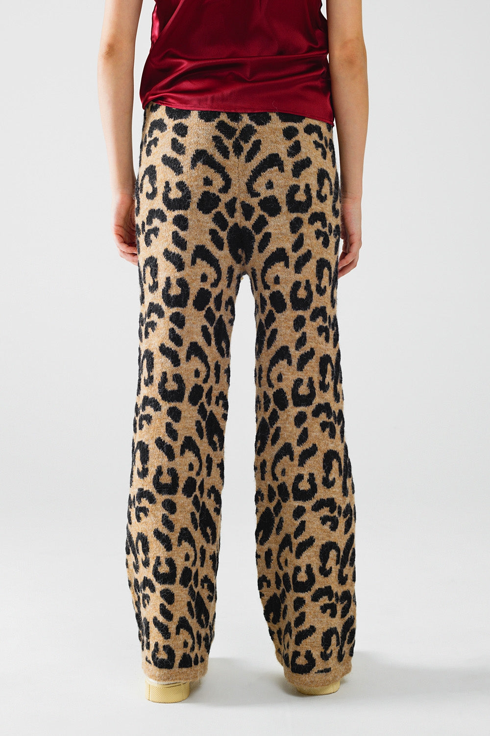 Calças com estampado de leopardo com malha elástica e pormenor de cordão