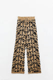 Calças com estampado de leopardo com malha elástica e pormenor de cordão