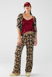 Calças com estampado de leopardo com malha elástica e pormenor de cordão