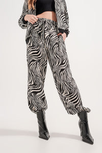 Calças de estampa de zebra de perna muito larga