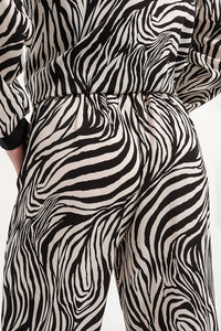 Calças de estampa de zebra de perna muito larga