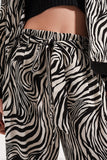 Calças de estampa de zebra de perna muito larga