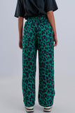 Calças de fundo largo em verde leopardo