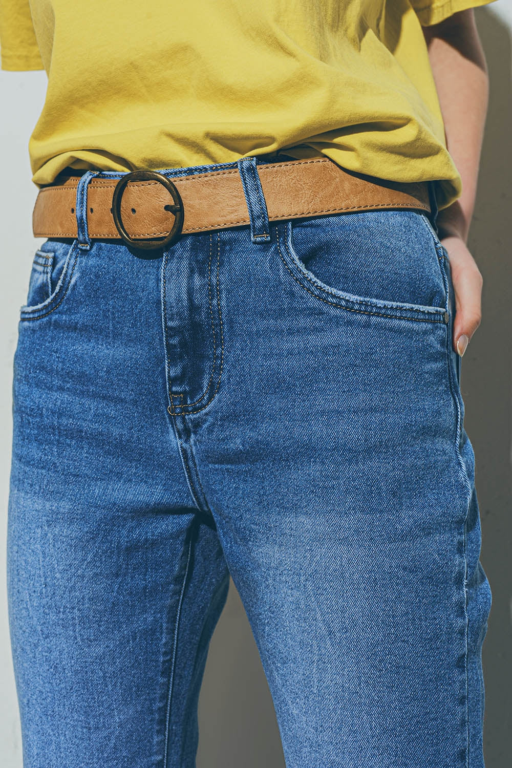 Calças de ganga de lavagem médias