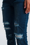 Calças de ganga estilo joggers em azul escuro