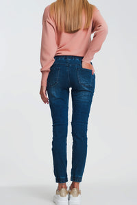 Calças de ganga estilo joggers em azul escuro