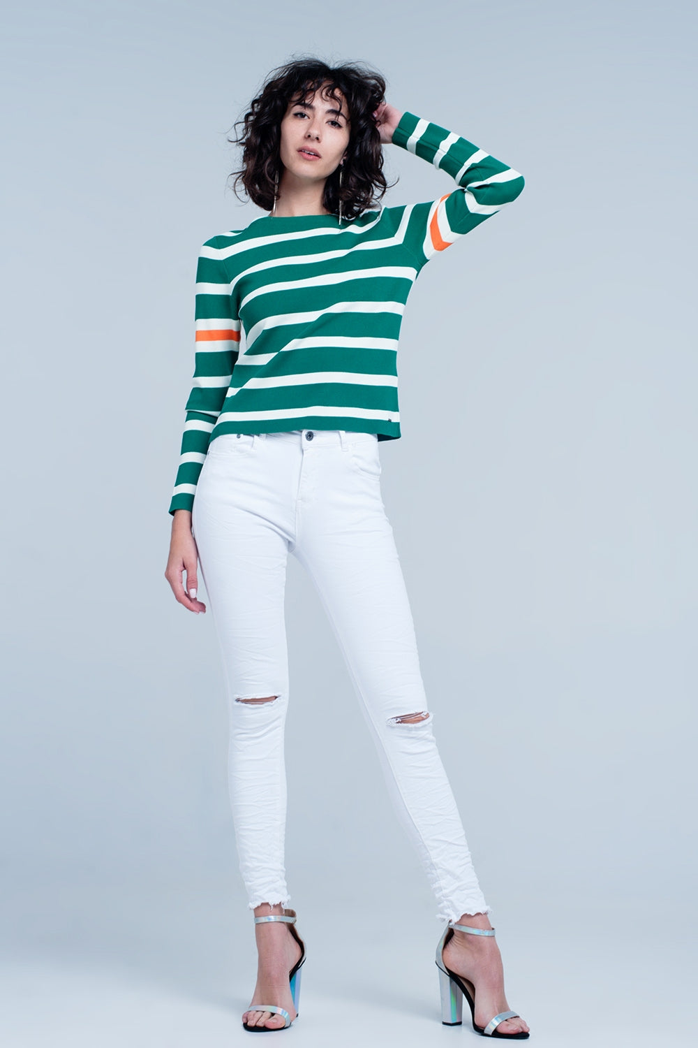 Calças de ganga skinny branca com rasgões nos joelhos