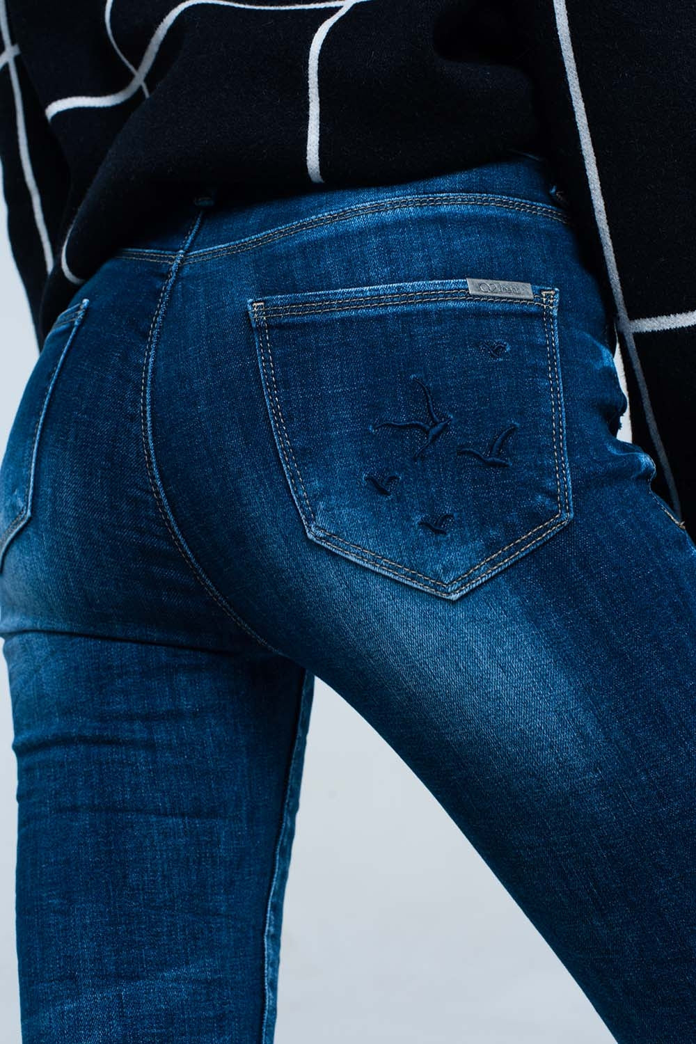 Calças de ganga skinny com detalhadas bordado no bolso