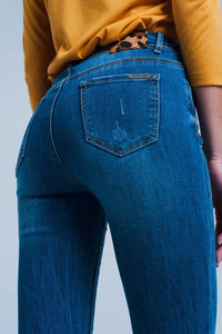 Calças de ganga skinny com detalhe leopardo