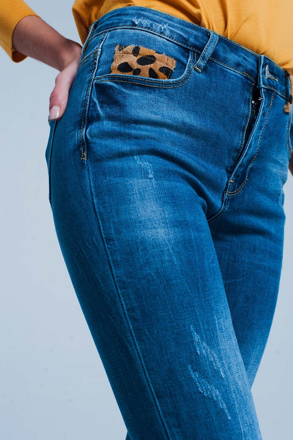 Calças de ganga skinny com detalhe leopardo