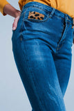 Calças de ganga skinny com detalhe leopardo