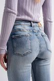 Calças de ganga skinny com detalhes de botões em azul claro