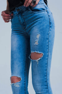 Calças de ganga skinny com efeito desgastado