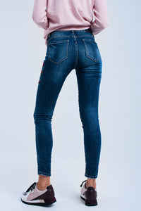 Calças de ganga skinny com flores