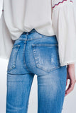 Calças de ganga skinny com lavagem vintage e rasgos marcados