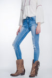 Q2 Calças de ganga skinny com lavagem vintage e rasgos marcados