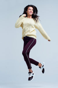 Calças de ganga skinny com listra lateral de metal