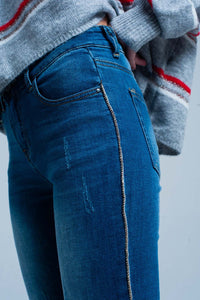 Calças de ganga skinny com listra lateral strass