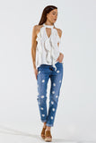 Calças de ganga skinny com margaridas brancas estampadas em lavagem média
