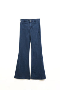 Calças de ganga skinny com pormenor de bolso à frente