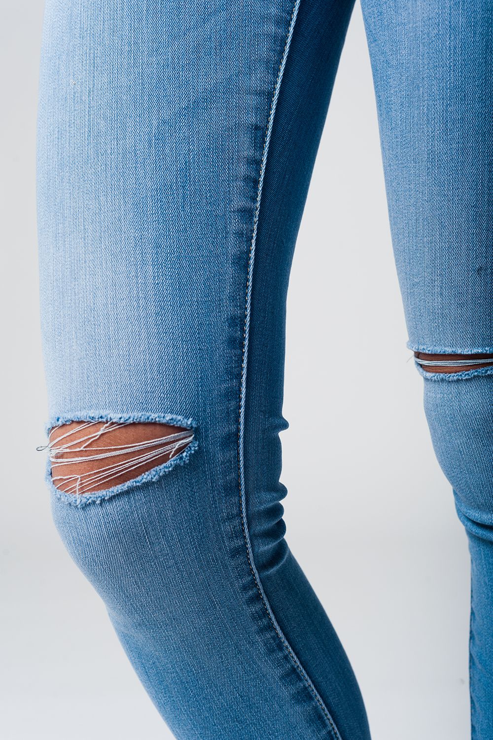 Calças de ganga Skinny com rasgões