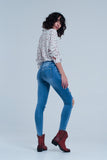 Calças de ganga skinny com rasgos muito desgastados