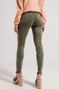 Calças de ganga skinny verdes com desenho rasgado