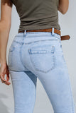 Calças de ganga super skinny azuis claras com laços e buracos rasgados