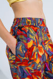 Calças de perna direita com estampado floral multicolorido em Shades Of Red
