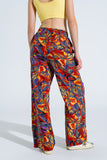 Calças de perna direita com estampado floral multicolorido em Shades Of Red
