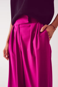 Calças de perna larga plissadas em fuchsia
