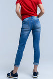 Calças jeans magras com flores pintadas