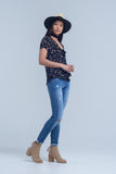 Calças jeans magras com joelho rasgado