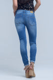 Calças jeans magras com joelho rasgado