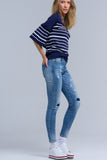 Calças jeans skinny com rips