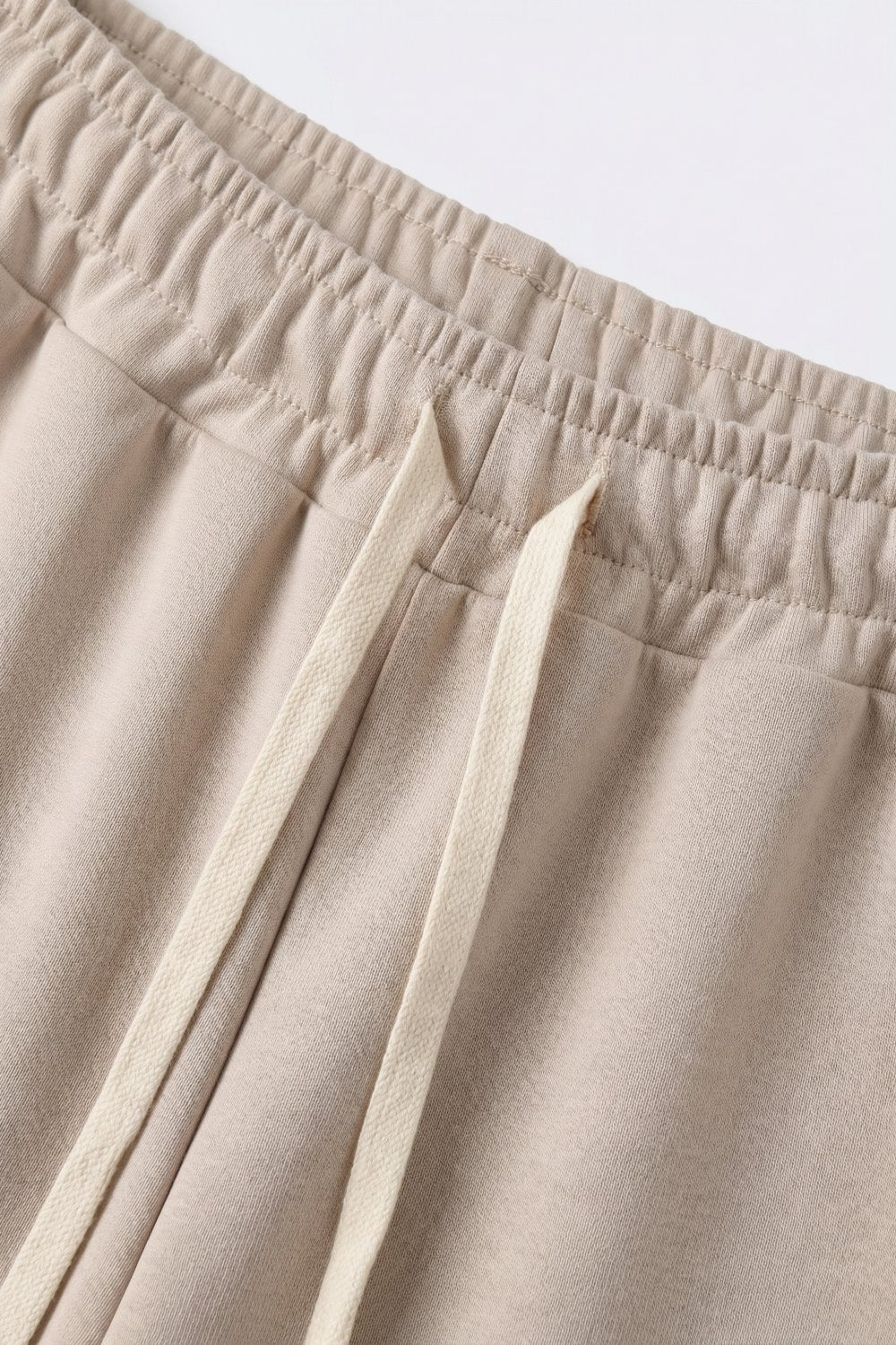 Calças Jogger de Malha Super-Macia em bege com Cintura de Cordão